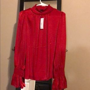 Red bell sleeve satin top
